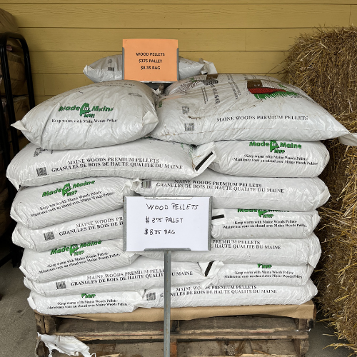 A stack of white bags labeled 
