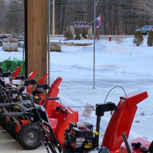 Snow blowers on display outside of Lucy Hardware.