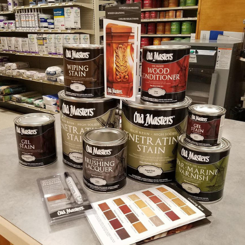 Paint and supplies on display inside of Lucy Hardware.