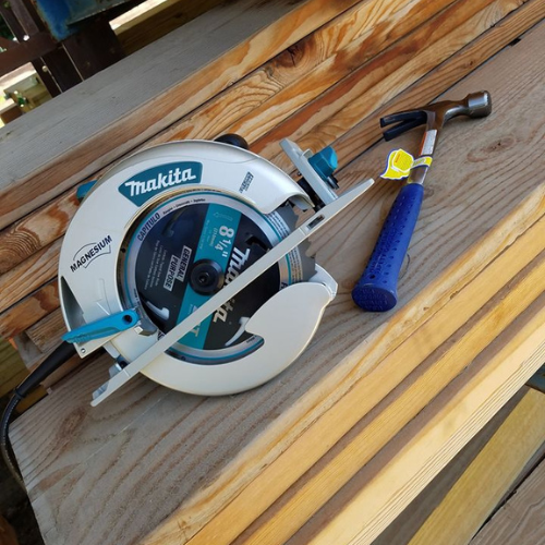 Lumber and a circular saw at Lucy Hardware.