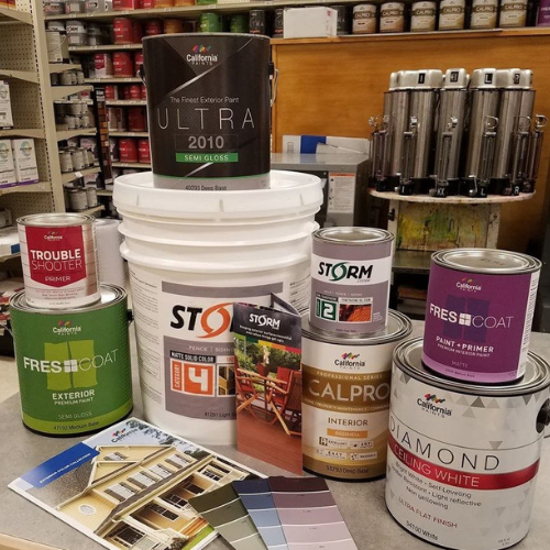 Paint and supplies on display inside of Lucy Hardware.